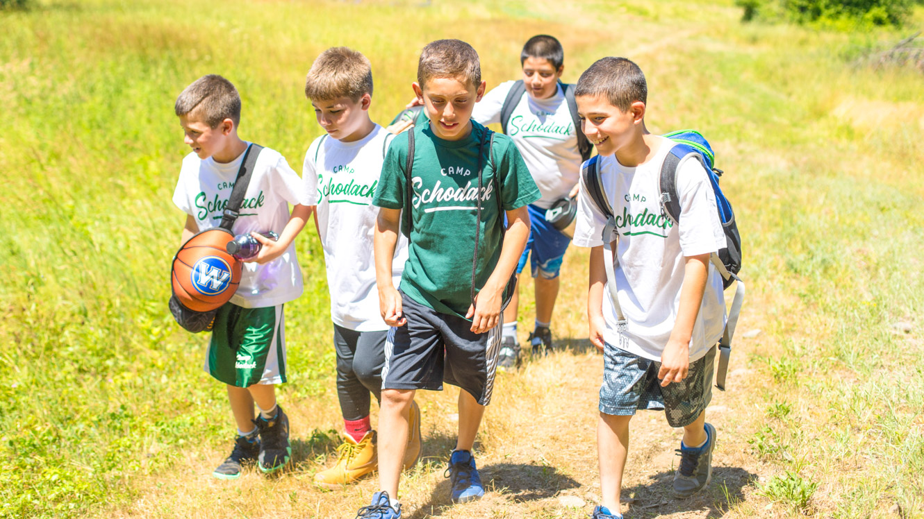 Boys on a day hike at summer camp