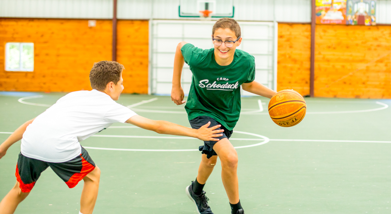 Campers play basketball in Schodack's gym